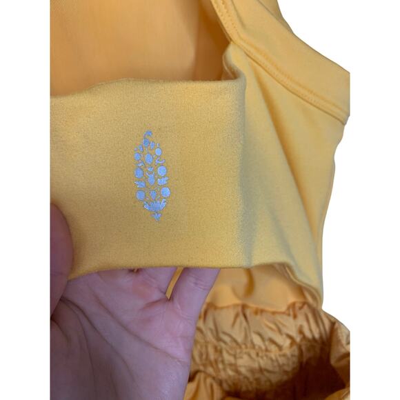 Free People | FP Movement The Way Home Runsie Romper in Marigold Yellow - Picture 7 of 7